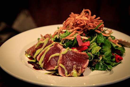 The Asian yellowfin tuna salad is dressed in a zingy wasabi aioli. Photograph by Nailya Maxyutova (COM’14)