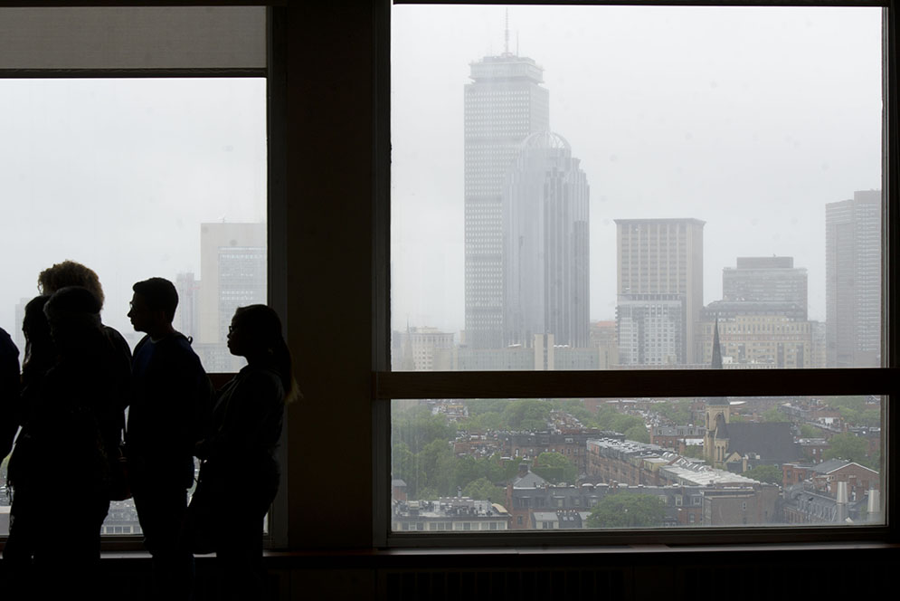 Students on a MED campus tour visit the Ziskind Lounge on the fourteenth floor of the MED building where they could take in a misty view of the city, including the Prudential Center June 1, 2015.   Photo by Cydney Scott