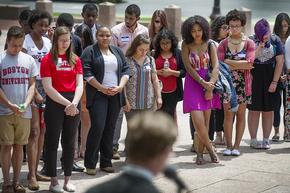 A small crowd gathers in Marsh Plaza during a vigil for the victims of the Charleston, SC shootings on Friday, June 19, 2015 Photo By Jackie Ricciardi 