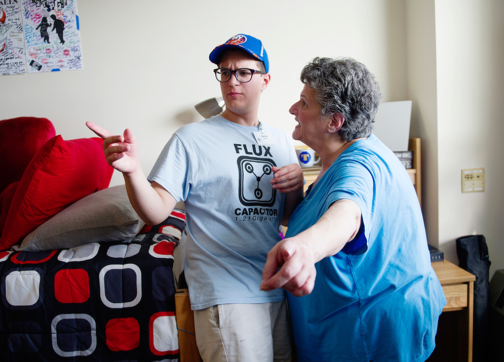 Sam DeSoto and his mother in Sam's new dorm during fall semester move-in
