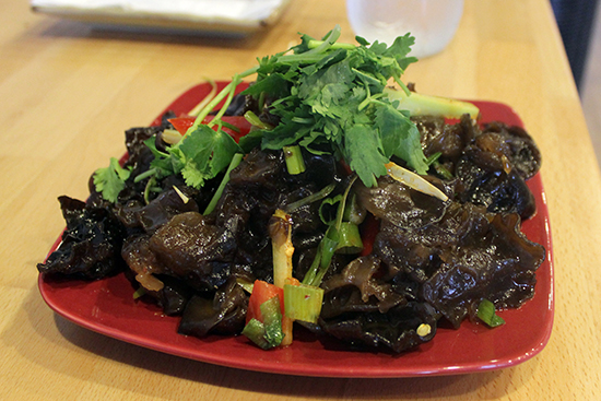 Cold wood ears features garlicky Chinese wood ear mushrooms served with a garnish of crispy bell peppers, cilantro, and scallions