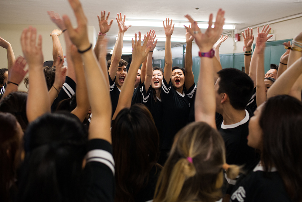 Fusion, a BU hip-hop dance troupe, rallies before they take the stage on Saturday, Oct. 24, 2015 to compete for the title for "BU's favorite dance group," in the BU So You Think You Can Dance competition. The BU China Care Fund will donate the money raised from the event to Half the Sky Foundation to support orphaned children in China. Photo by Jake Belcher.