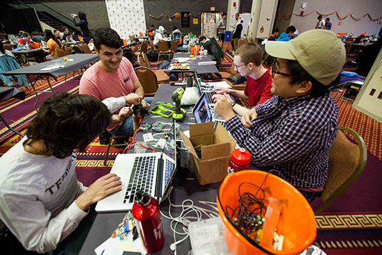 Creating a demonic teddy bear were, clockwise from upper left, Nicholas Maresco, Doug Roeper, Brian Tan, and Pablo Velarde. Photo by Kristyn Ulanday