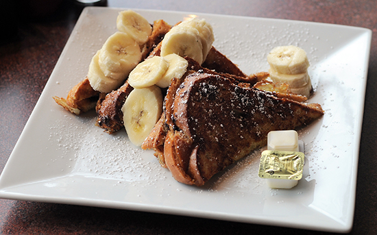 The challah Nutella-stuffed French toast with bananas makes a perfect light entrée.