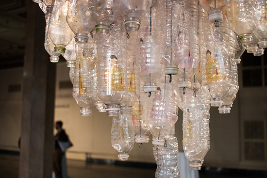 Willie Cole: Aquahallic features two chandeliers by the artist, each made from thousands of plastic water bottles. Photo by Joshua Buckno (GRS’05, Questrom’14)