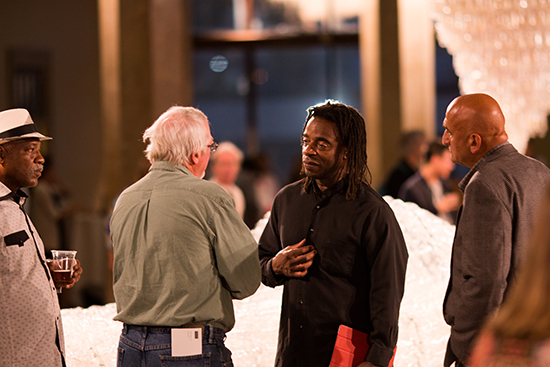 Willie Cole (third from left) at the opening reception of his show at the 808 Gallery. Photo by Joshua Duttweiler (CFA’17)