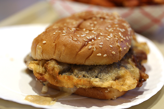 The portobello burger—a fried portobello mushroom filled with melted cheese—is one of Lee’s vegetarian burger options.