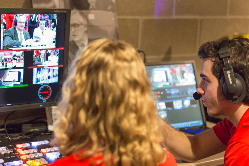 Members of BUTV10 broadcast the men's basketball home opener against Northeastern at Case Gym. Director Justin Akiva (COM '18) works with technical director Caroline Rickert (COM '18) to make sure to catch all of the action for viewers at home. 