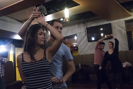 Milena Morais and Valmir Coelho, both Brazilian natives, are two of the instructors on hand to teach beginners.