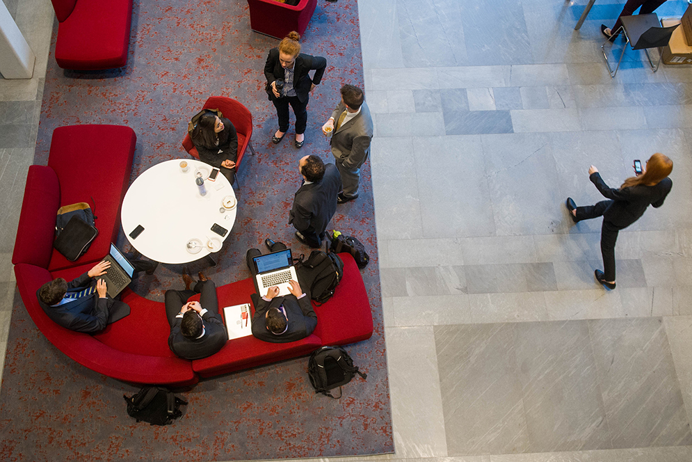 In the Sumner M. Redstone Building, first year LAW students prepare for a day of mock contract negotiating as part of Lawyering Lab, a mandatory, one-week program giving hands-on experience in negotiating and deal-making. Photo by Cydney Scott