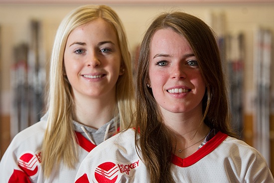 Forward right wing Rebecca Leslie (Questrom'18), left, and forward center Victoria Bach (CGS'18) of BU women's ice hockey players.