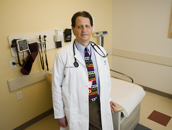 Daniel Alford (SPH’86, MED’92), a School of Medicine associate professor of medicine and the assistant dean for continuing medical education, is leading the effort to expand MED’s opioid and addiction curriculum. Photos by Cydney Scott