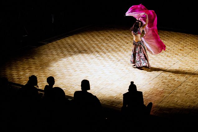 Attendees watch belly dancer Elizabeth Nelson during Lebanese Night hosted by BU's Lebanese Club in the Metalf Trustee Center. The event featured authentic ccultural music, food, performances and dancing. Photo by Alexandra Wimley (COM'16)