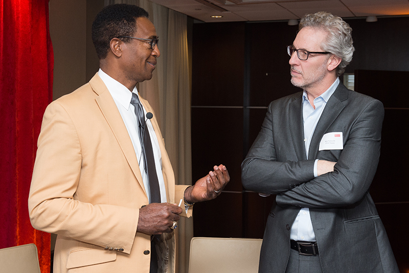 Tedeschi (right) with Haynes, who told the panel audience that college and pro football are now safer than youth football. Tedeschi (right) with Haynes, who told the panel audience that college and pro football are now safer than youth football.