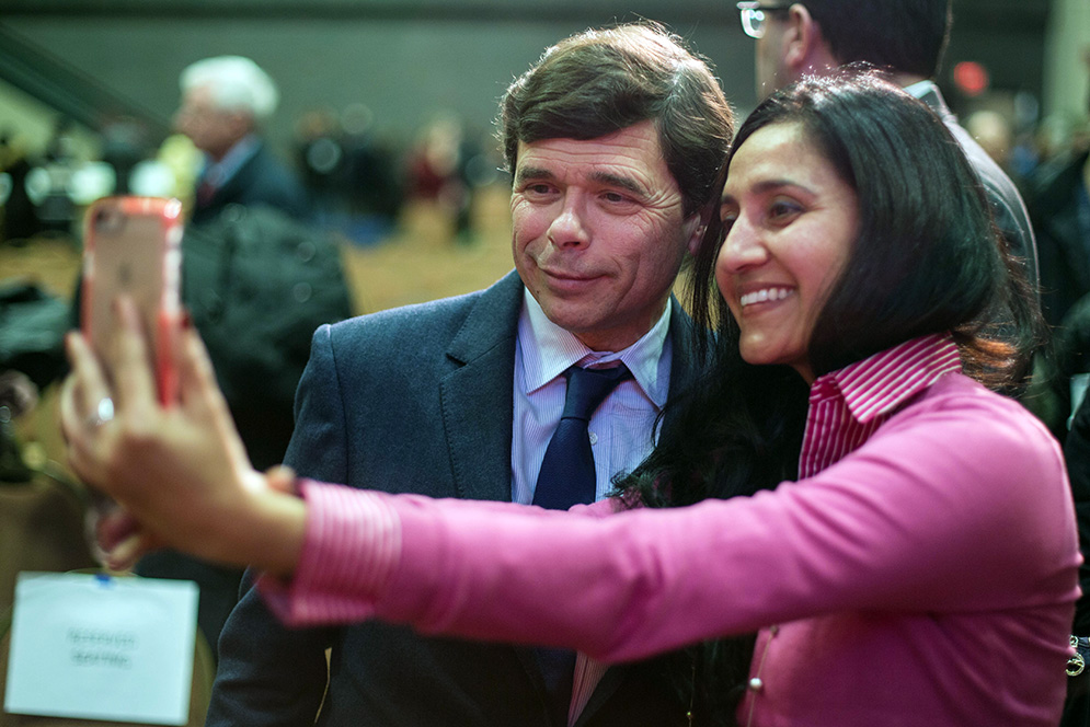 BU Alums unite over a selfie. Mike Rezendes (CAS'78), a Pulitzer Prize winning Boston Globe investigative reporter, and Mark Ruffalo's character in the Oscar-winning movie Spotlight, and Bindu Dadlani (SMG'98) take a selfie after Rezendes' talk at the Metcalf Ballroom on Tuesday night. Rezendes, who was the speaker at the Friends Speaker Series, an event organized by the Howard Gotlieb Archival Research Center, attracted a large crowd at the event. Photo by Pankaj Khadka (COM'16)