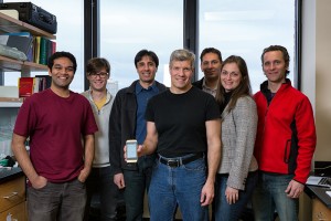 Biomedical Engineering Professor Edward Damiano in his lab with fellow researchers and their bionic pancreas