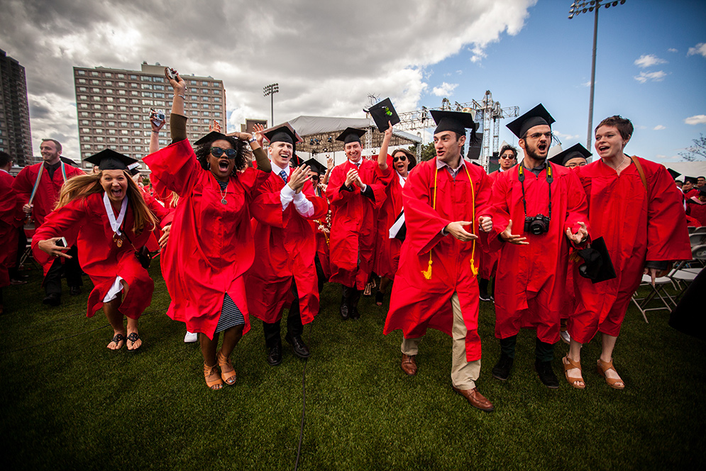 Members of the Class of 2016 celebrate following the close of Boston University's 143rd Commencement