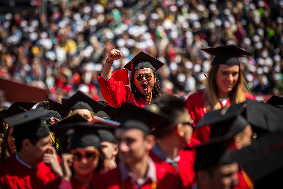 Graduate Allan Chen pumps his fist in excitement during Boston University's 143rd Commencement