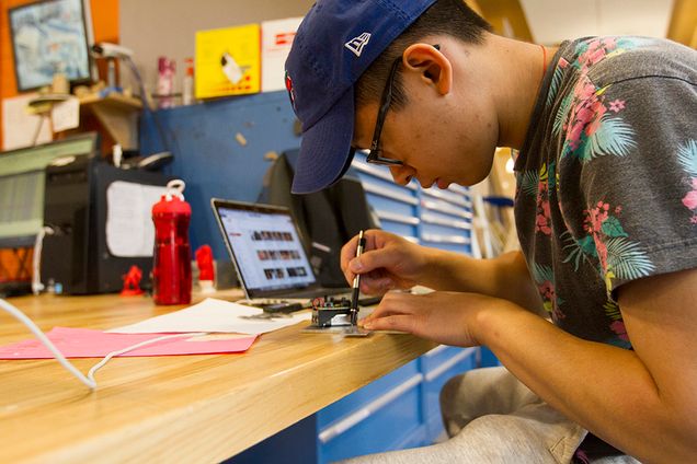 Engineering Student Working on Electronics