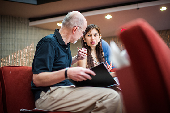 Anais Azul consults with Chamber Orchestra of Boston conductor David Feltner