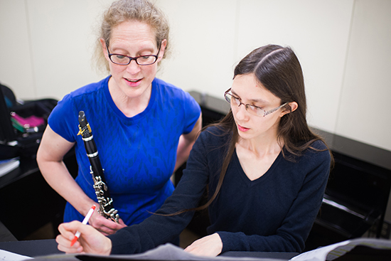 Lara Poe rehearses with clarinetist Karen Luttik