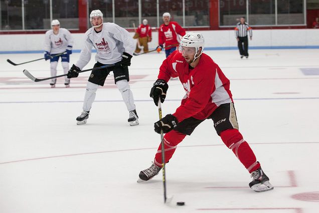 Nick Bonino skates with the puck during the Comm Ave Charity Classic at the Walter Brown Arena