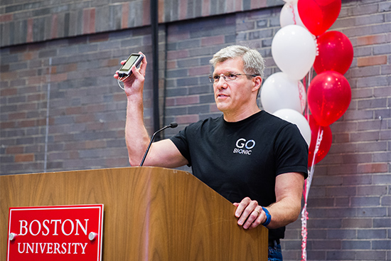 Edward Damiano holds the iLet bionic pancreas while accepting the Innovator of the Year award at the Boston University Tech, Drugs, and Rock n' Roll event