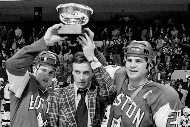 Rick Meagher, Jack Parker and Mike Eruzione hold the trophy after Boston University won the 1977 ECAC Championship at the Boston Garden