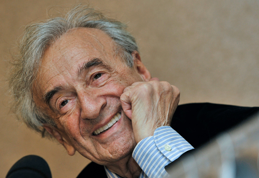 Elie Wiesel smiles during a news conference in Budapest, Hungary.