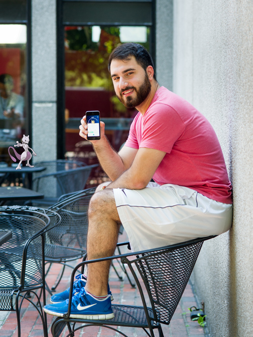 portrait of college student Arie Orchanian with Pokemon character Mewtwo