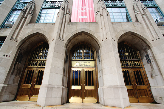 Doors at an entrance to the College of Arts and Sciences building