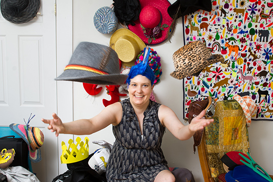 Caroline Moore-Kochlacs (GRS’16) with a small selection of the hats she has worn or plans to wear