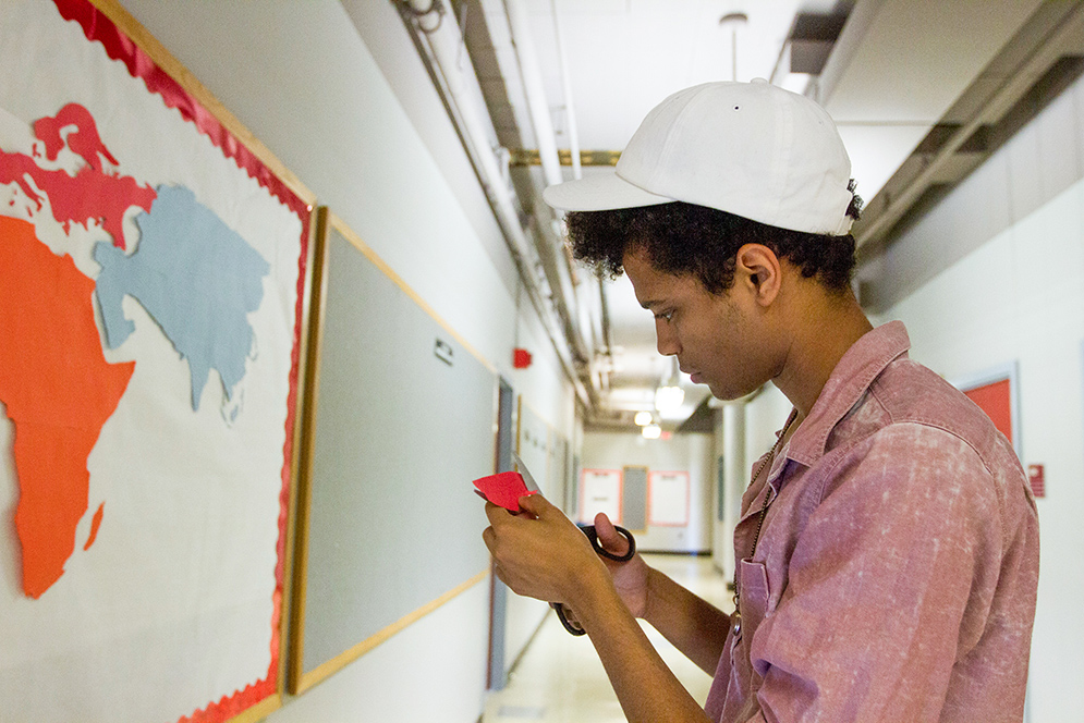 David Castillo (CFA’17) creates a map in CFA that will display where in the world the theatre majors are from