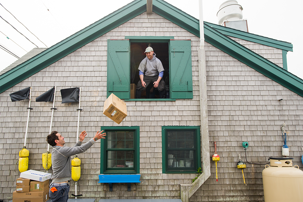 Chef Chris Fischer helps out during a shopping trip to Larson's Market in Menemsha, Massachusetts