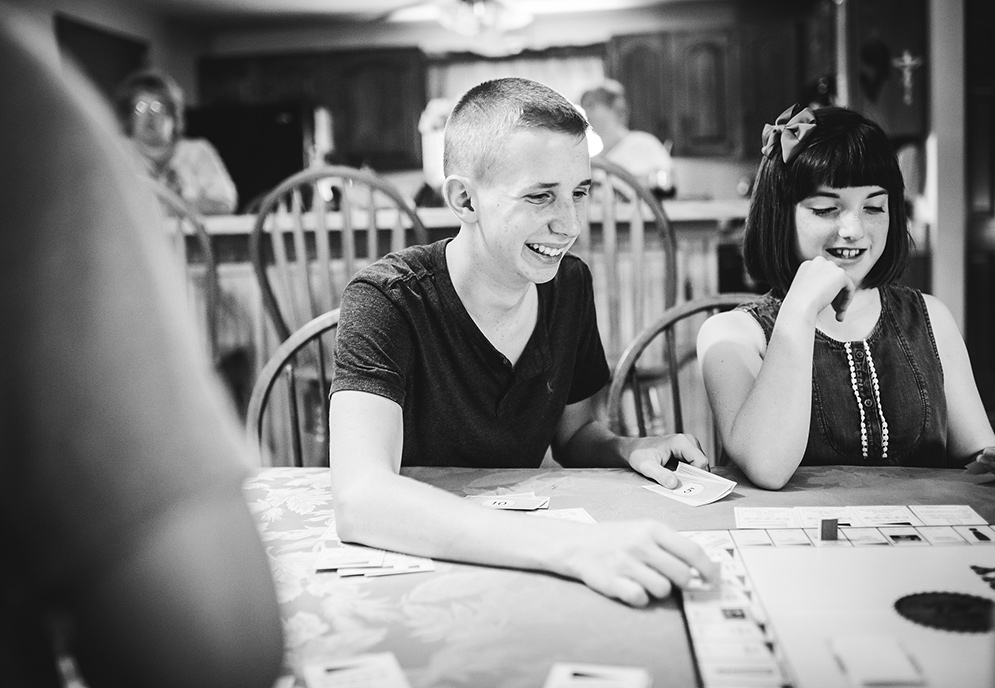 Matt Robson plays Monopoly with his cousins