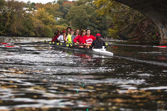 women’s openweight rowing team at a practice on the Charles River
