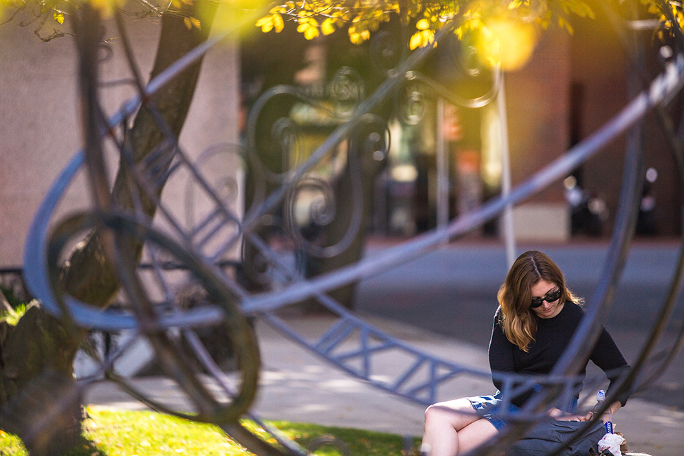Emily Hartwell (COM '17) eating her lunch outside