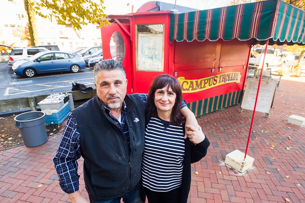 Nadim Kiwan and Maria Kiwan pose in front of their Campus Trolley business
