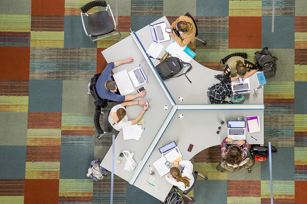 Aerial view of students studying in the Metcalf Center for Science and Engineering