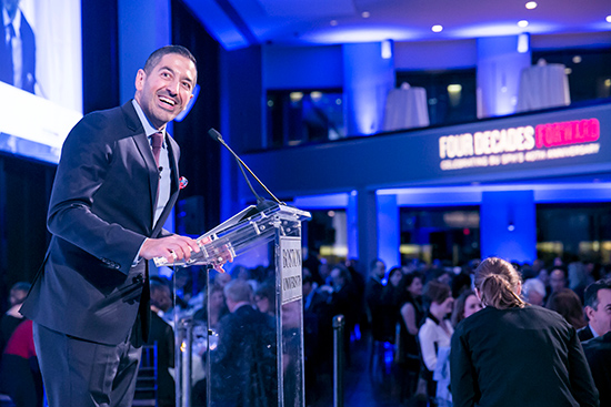Sandro Galea, dean of SPH and Robert A. Knox Professor giving a speech behind a podium