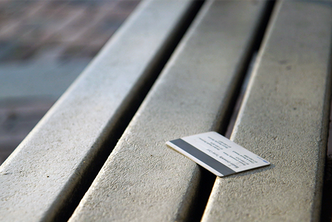 Lost Boston University terrier card student id on a bench