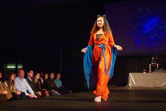 Boston University student walks down runway at BU Fashion & Retail Association fashion show.