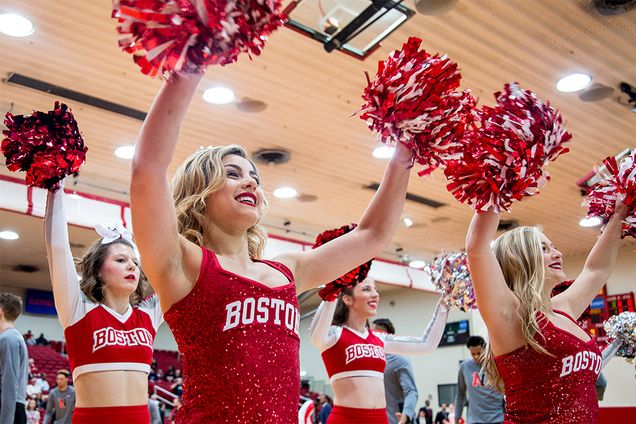 boston university dance team and cheerleaders pump up the crowd during a men's basketball game at Case Gym