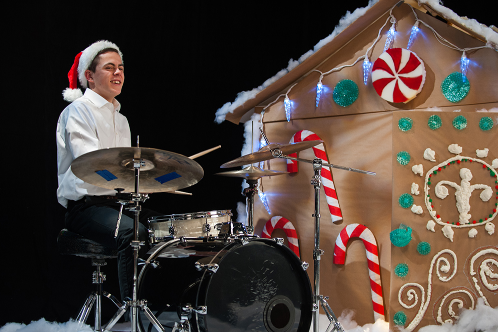 BU student playing drums.