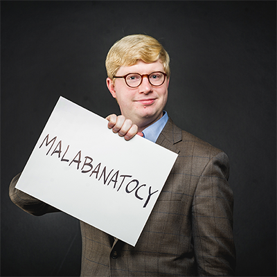 Tyler Perrachione, Director of Boston University Sargent College Communication Neuroscience Research Laboratory, holds a card showing a word used in the nonword repetition tests studying language disorders and phonological working memory in the dyslexic brain