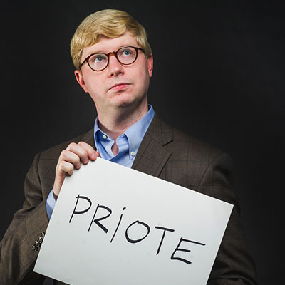 Tyler Perrachione, Director of Boston University Sargent College Communication Neuroscience Research Laboratory, holds a card showing a word used in the nonword repetition tests studying language disorders and phonological working memory in the dyslexic brain