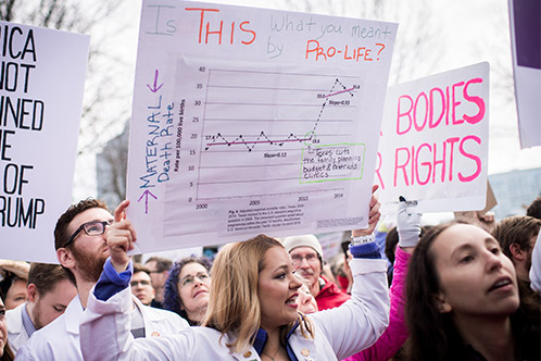 Andrea Foster and marchers behind her