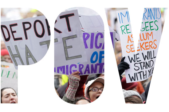 Demonstrators display pro-immigrant signs at the Boston Protest Against Muslim Ban and Anti-Immigration Orders, January 29, 2017 in Copley Square, Boston