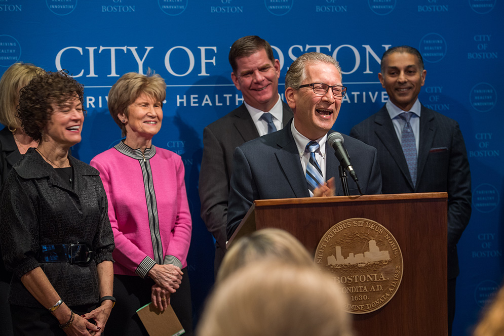 Azer Bestavros at podium, behind him Katie Conboy, Evelyn Murphy, Marty Walsh, and Eddie Ahmed