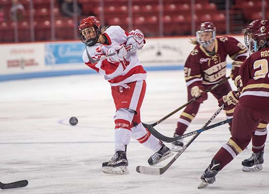 BU Terriers women's ice hockey player Maddie Alia takes a shot on goal during the first round of the 39th Annual Women's Beanpot Tournament